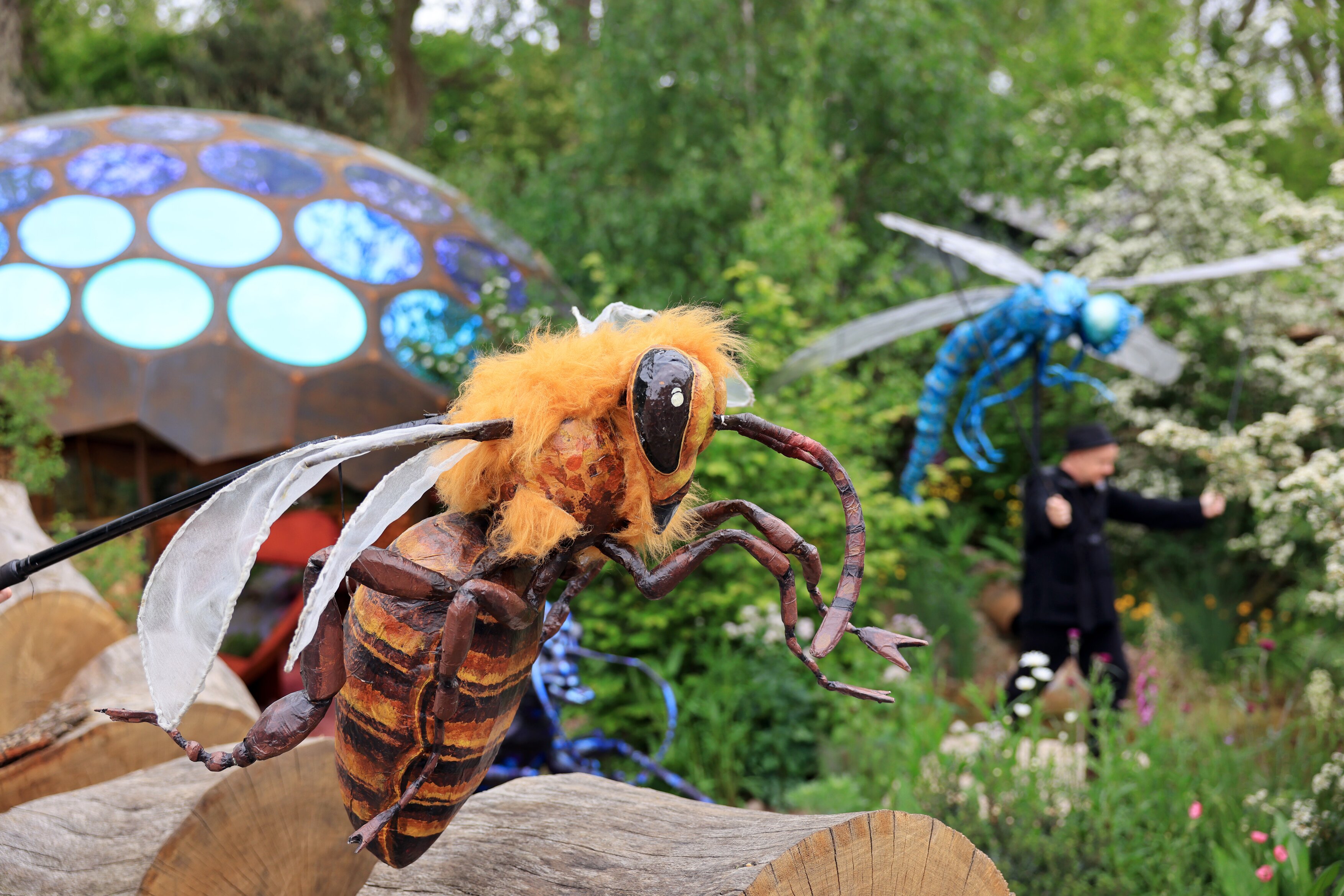 Chelsea Flower Show - Giant fake bee in a garden