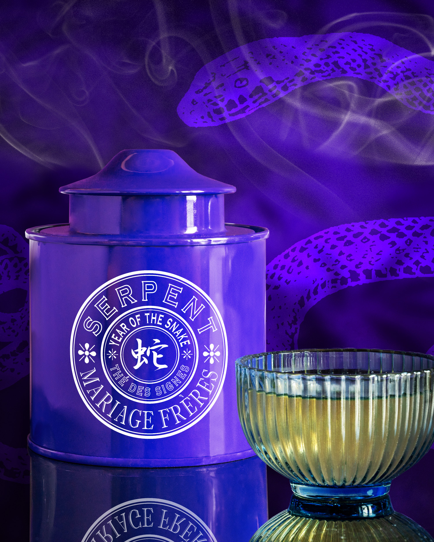 Luxury Chinese New Year of the Snake  - mariage freres tea in a purple pot beside a glass of hot tea