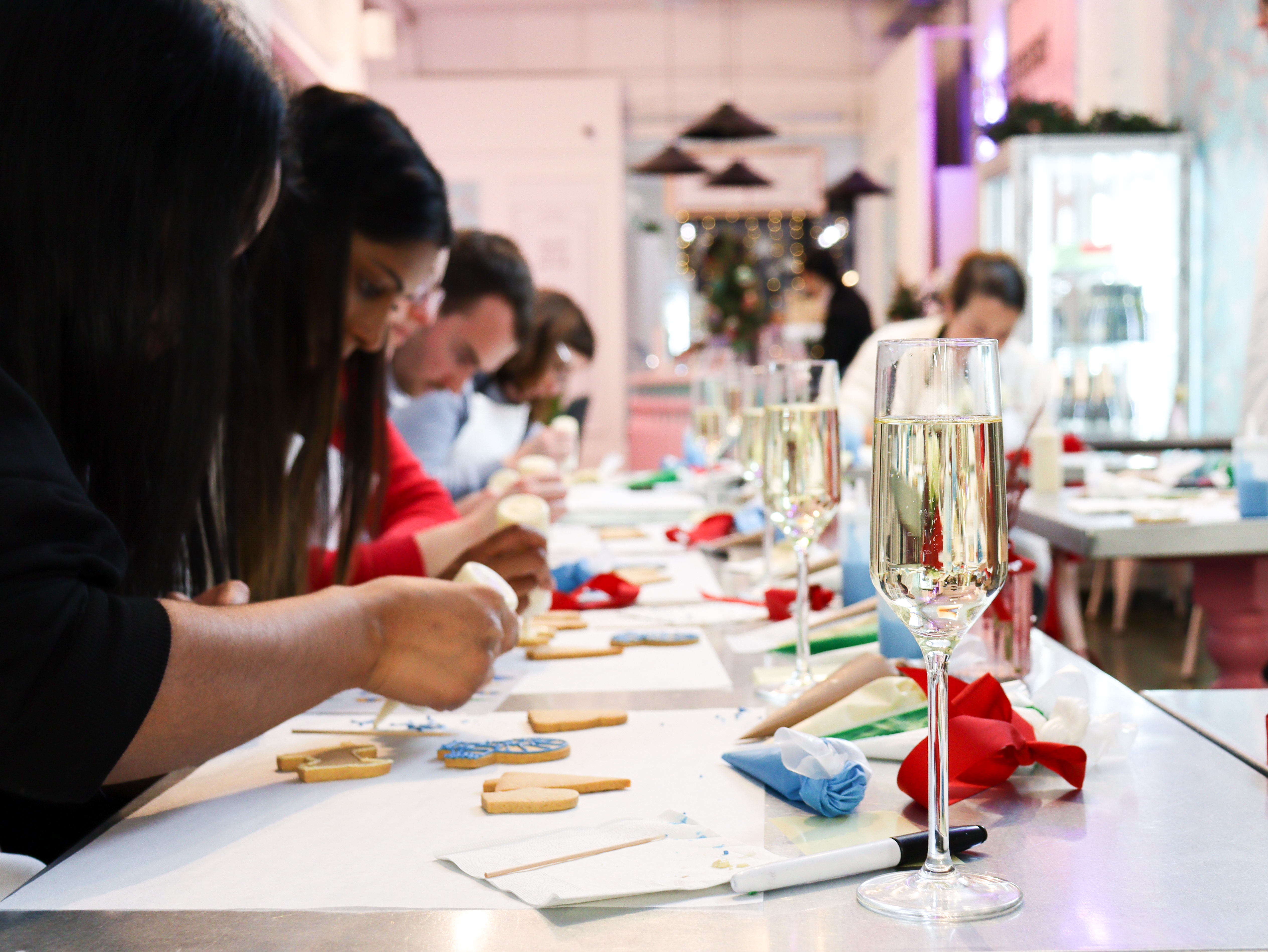 Alternative Valentine's Day London Experiences - People icing biscuits at a Biscuiteers Icing Lates Session