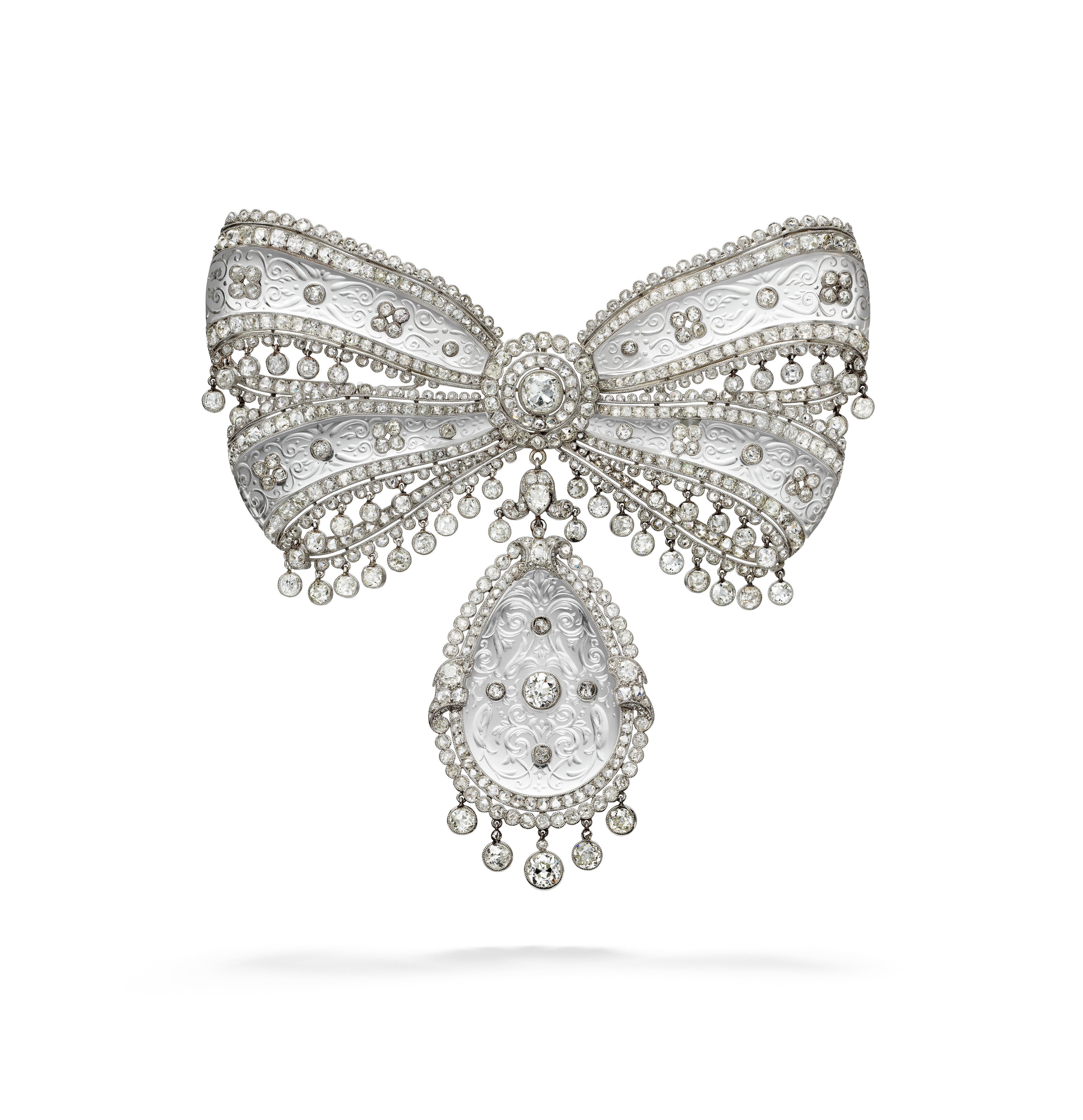 Cartier V A - a silver brooch is the shape of a bow