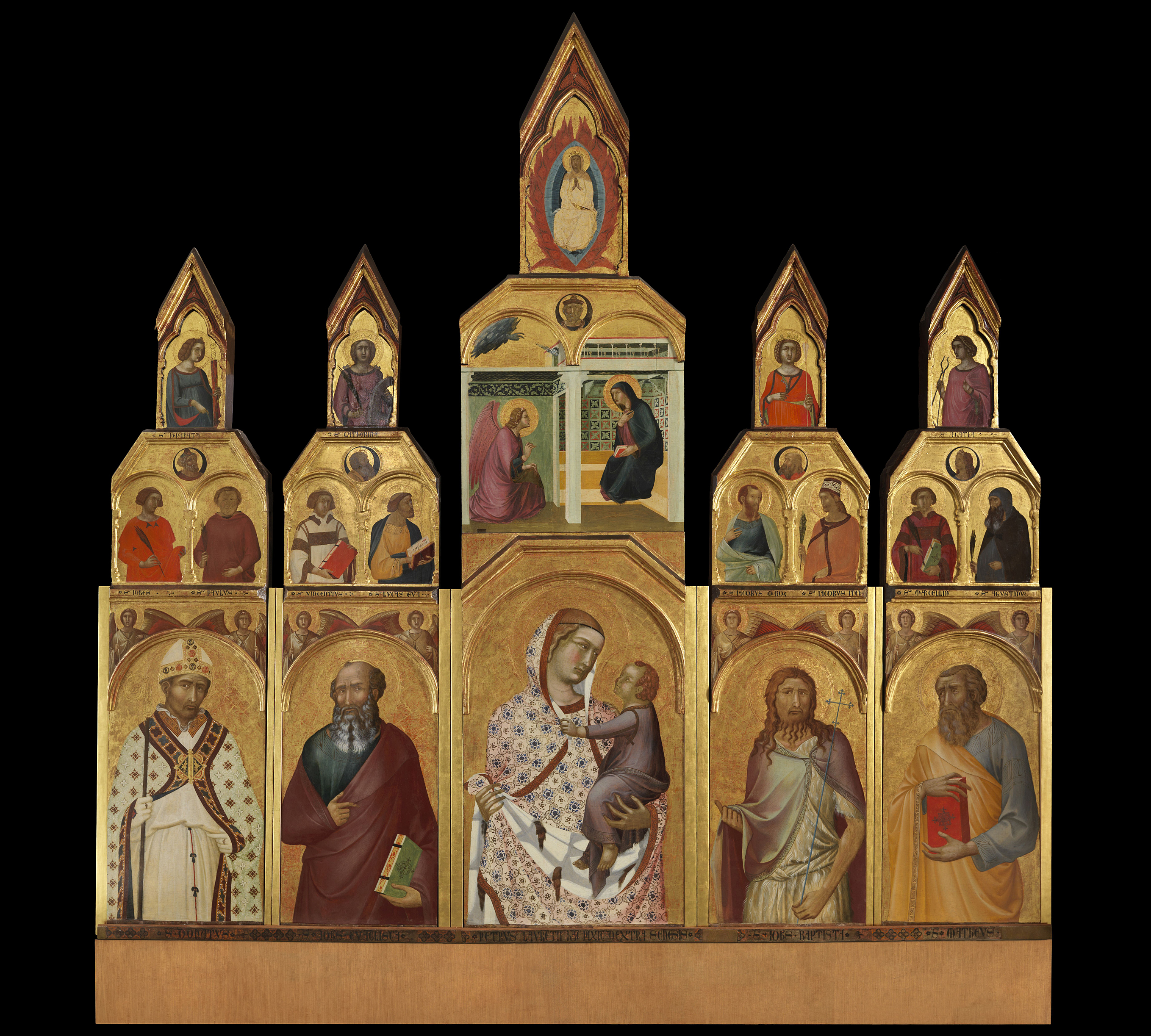 Siena at The National Gallery - Pieve Polyptych by Pietro Lorenzetti. A Gothic polyptych altarpiece with gold leaf, featuring the Virgin Mary and Christ Child, saints, angels, and biblical scenes, including the Annunciation.